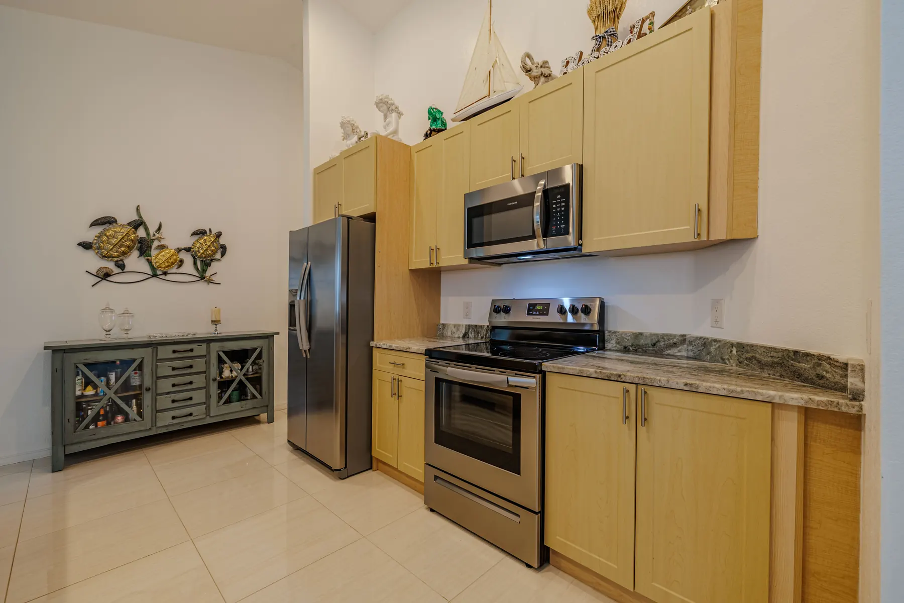 Kitchen with stainless appliances and granite counters