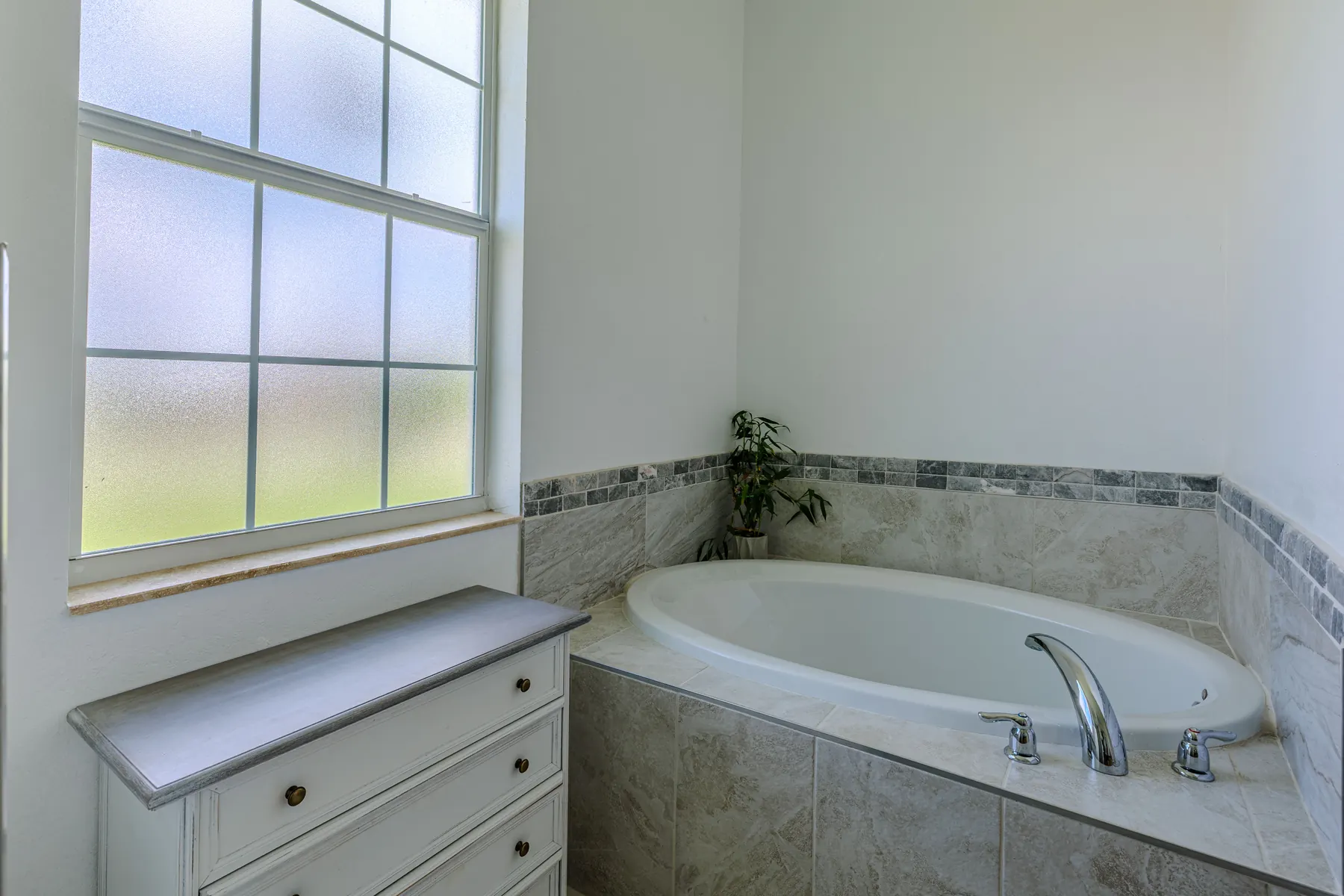 Soaking tub in the primary bathroom