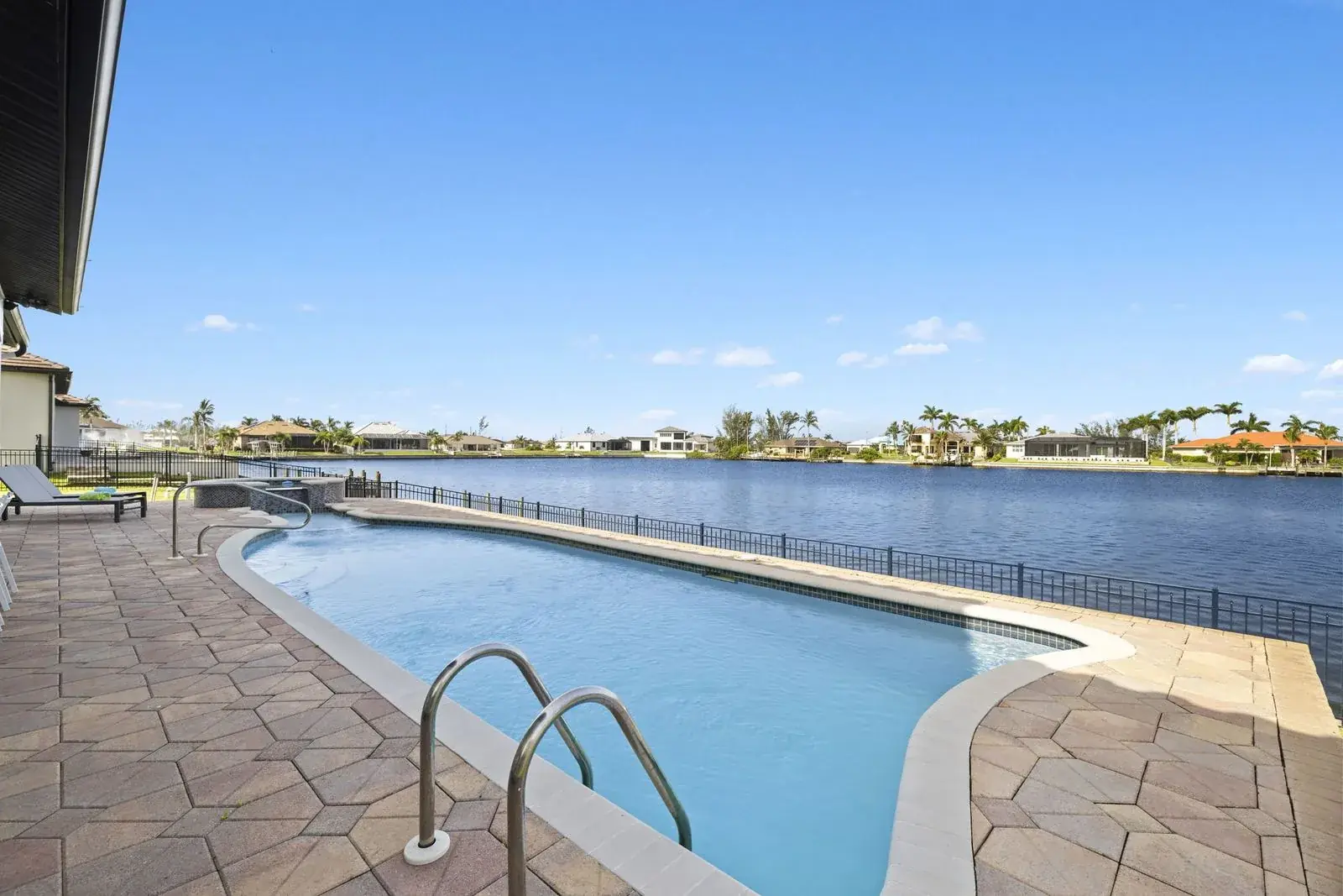 Pool deck looking out over a wide Cape Coral canal